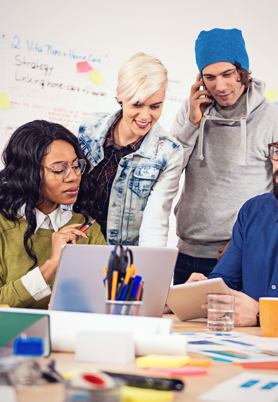 Young business people in office, developing start-up business ideas